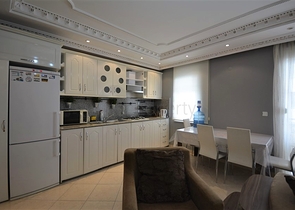 Трехкомнатная квартира в районе Махмутлар