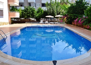 Трехкомнатная квартира в районе Махмутлар