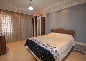 Трехкомнатная квартира в районе Махмутлар