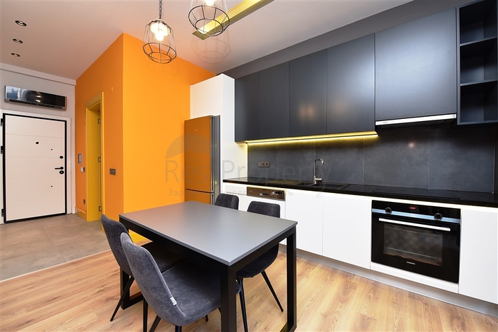 Садовый дуплекс планировки 2+1 в районе пляжа Клеопатра