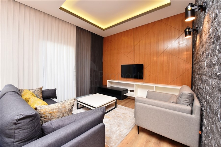 Садовый дуплекс планировки 2+1 в районе пляжа Клеопатра