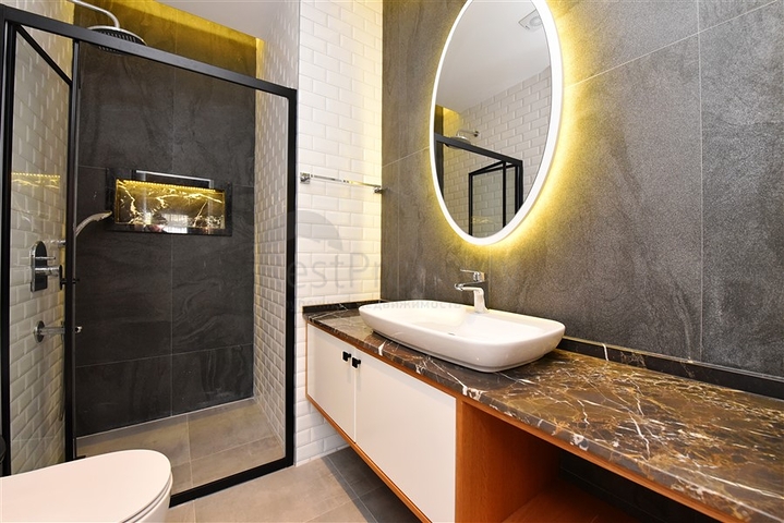 Садовый дуплекс планировки 2+1 в районе пляжа Клеопатра