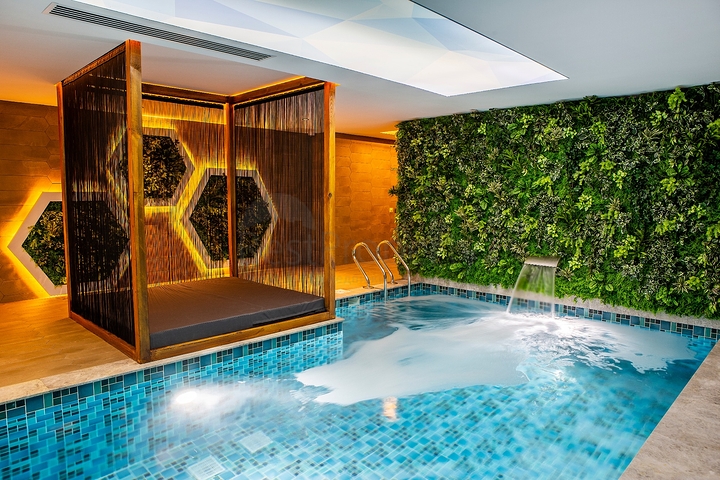 Садовый дуплекс планировки 2+1 в районе пляжа Клеопатра