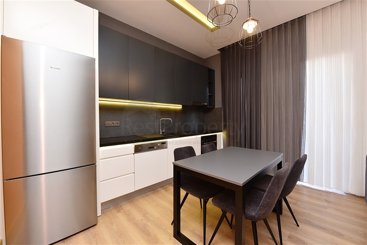 Садовый дуплекс планировки 2+1 в районе пляжа Клеопатра