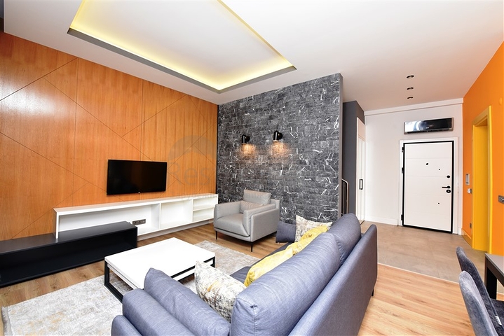 Садовый дуплекс планировки 2+1 в районе пляжа Клеопатра