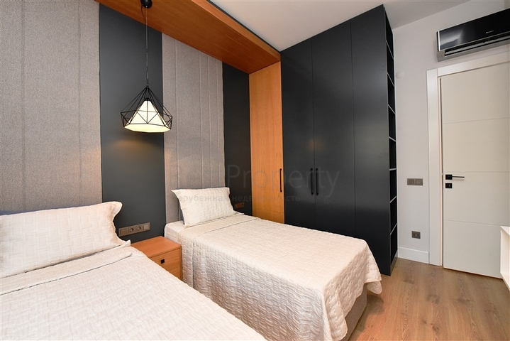 Садовый дуплекс планировки 2+1 в районе пляжа Клеопатра