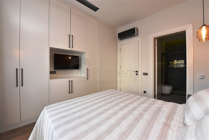 Садовый дуплекс планировки 2+1 в районе пляжа Клеопатра