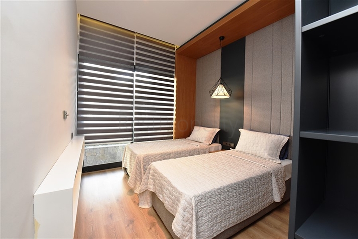 Садовый дуплекс планировки 2+1 в районе пляжа Клеопатра