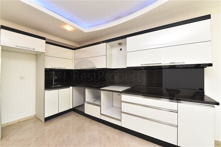 Квартира планировки 2+1 с чистовой отделкой в районе Оба