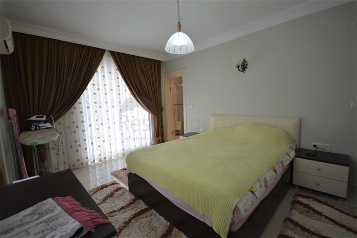 Просторная трехкомнатная квартира в районе Махмутлар