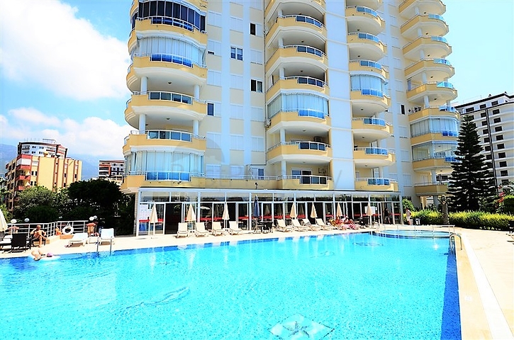 Просторная трехкомнатная квартира в районе Махмутлар