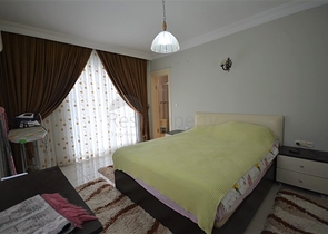 Просторная трехкомнатная квартира в районе Махмутлар