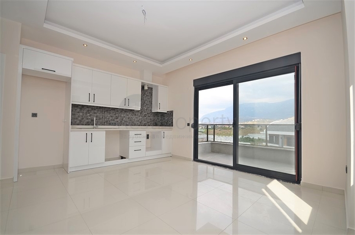 Квартира 1+1 в новом комплексе в районе Каргыджак