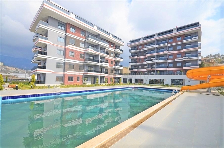 Квартира 1+1 в новом комплексе в районе Каргыджак