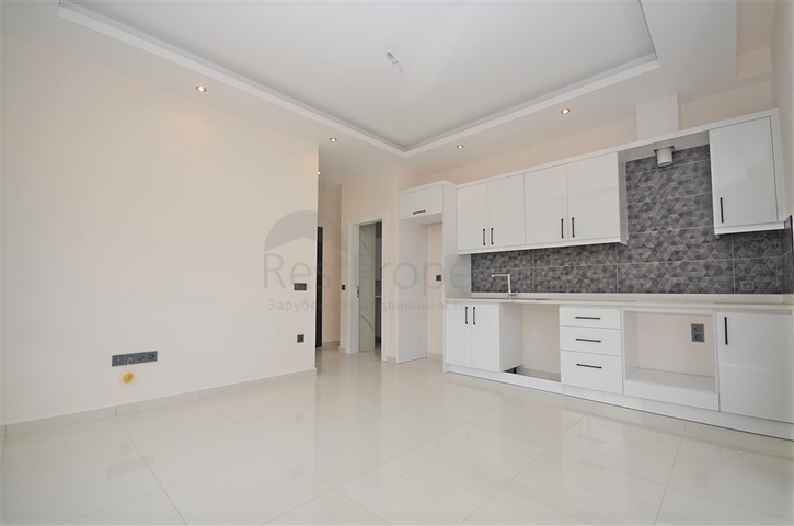 Квартира 1+1 в новом комплексе в районе Каргыджак