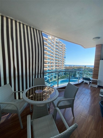 Двухкомнатная квартира в шикарном комплексе района Махмутлар