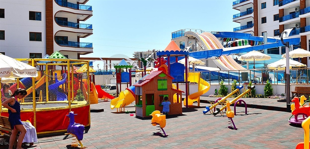 Двухкомнатная квартира в шикарном комплексе района Махмутлар