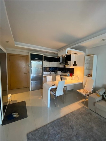 Двухкомнатная квартира в шикарном комплексе района Махмутлар