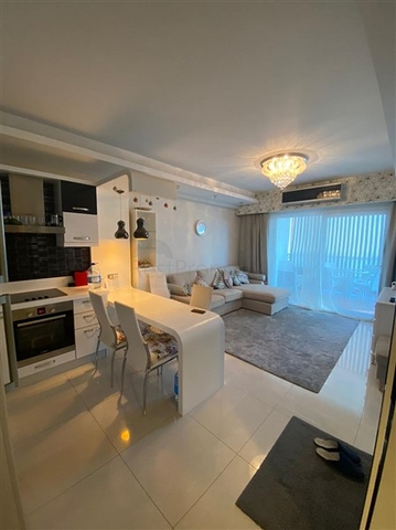 Двухкомнатная квартира в шикарном комплексе района Махмутлар