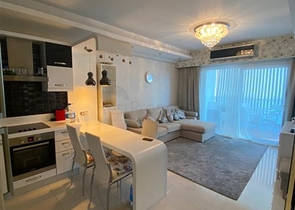 Двухкомнатная квартира в шикарном комплексе района Махмутлар