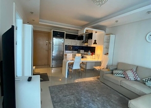 Двухкомнатная квартира в шикарном комплексе района Махмутлар