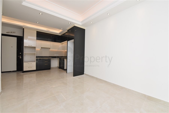 Квартира 1+1 в новом комплексе в районе Махмутлар