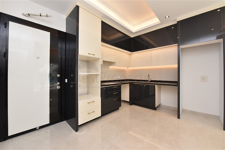 Квартира 1+1 в новом комплексе в районе Махмутлар