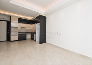 Квартира 1+1 в новом комплексе в районе Махмутлар