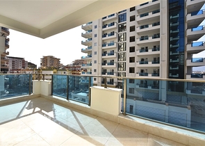 Квартира 1+1 в новом комплексе в районе Махмутлар