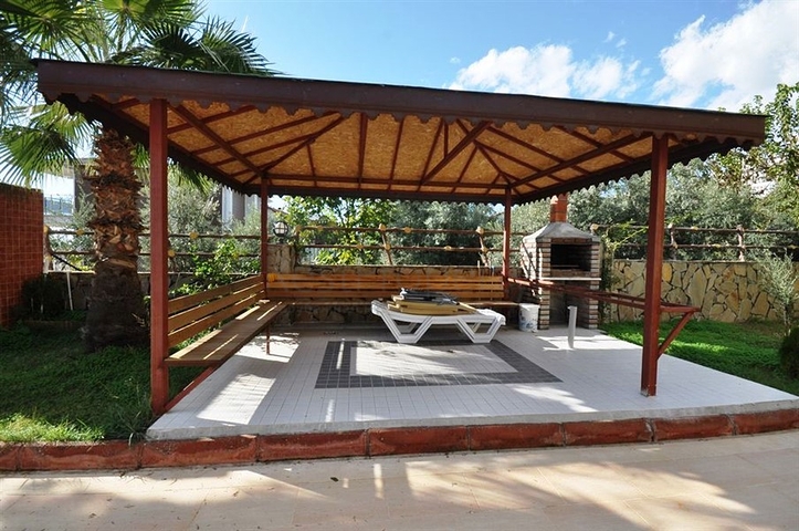 Вилла 4+1 с видом на море в районе Демирташ