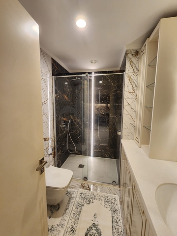 Двухкомнатная квартира в комплексе на первой линии в Махмутларе