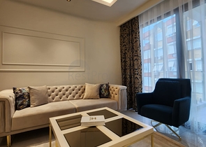 Двухкомнатная квартира в комплексе на первой линии в Махмутларе