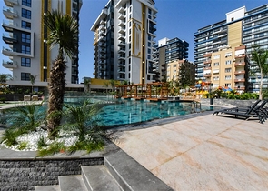 Двухкомнатная квартира в комплексе на первой линии в Махмутларе