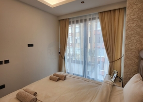 Двухкомнатная квартира в комплексе на первой линии в Махмутларе