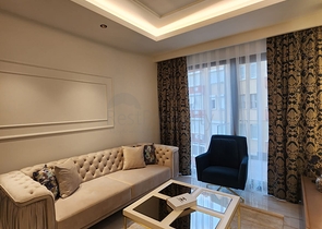 Двухкомнатная квартира в комплексе на первой линии в Махмутларе