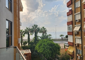 Двухкомнатная квартира в комплексе на первой линии в Махмутларе