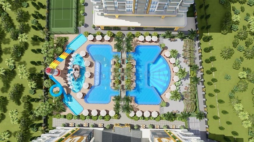 Квартира планировкой 1+1 в современном комплексе в Махмутларе