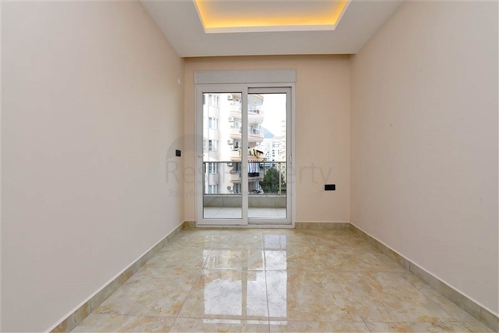 Квартира 1+1 в новом комплексе в районе Махмутлар