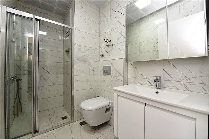 Квартира 1+1 в новом комплексе в районе Махмутлар