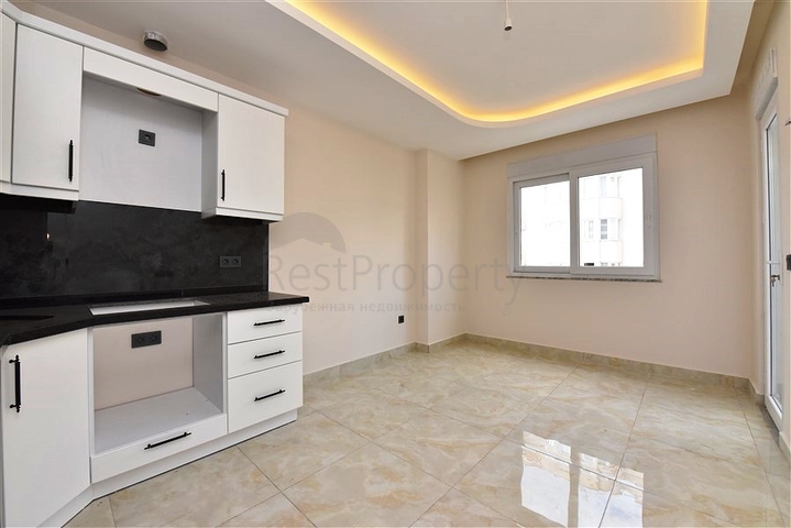 Квартира 1+1 в новом комплексе в районе Махмутлар