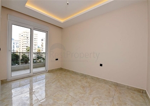 Квартира 1+1 в новом комплексе в районе Махмутлар