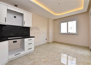 Квартира 1+1 в новом комплексе в районе Махмутлар