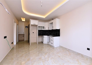 Квартира 1+1 в новом комплексе в районе Махмутлар