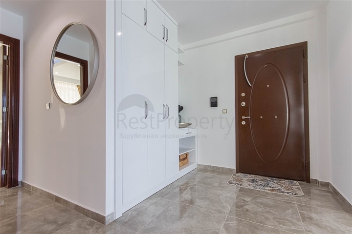 Садовый дуплекс 3+1 с видом на море в районе Каргыджак