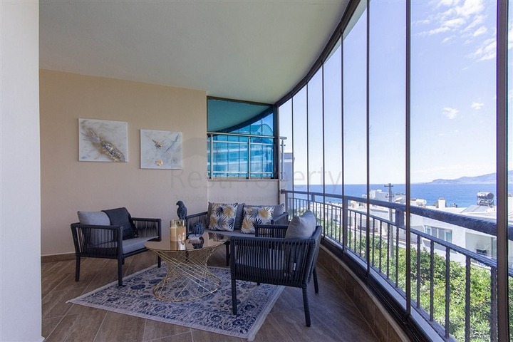 Садовый дуплекс 3+1 с видом на море в районе Каргыджак