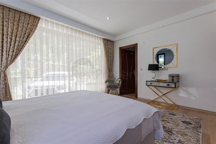 Садовый дуплекс 3+1 с видом на море в районе Каргыджак