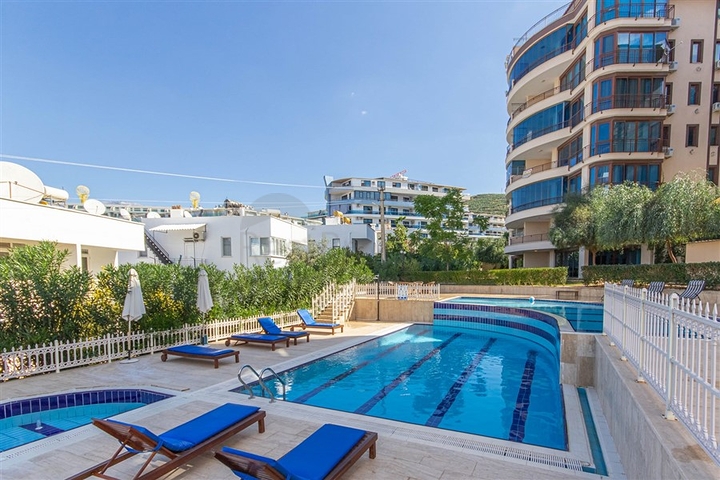 Садовый дуплекс 3+1 с видом на море в районе Каргыджак