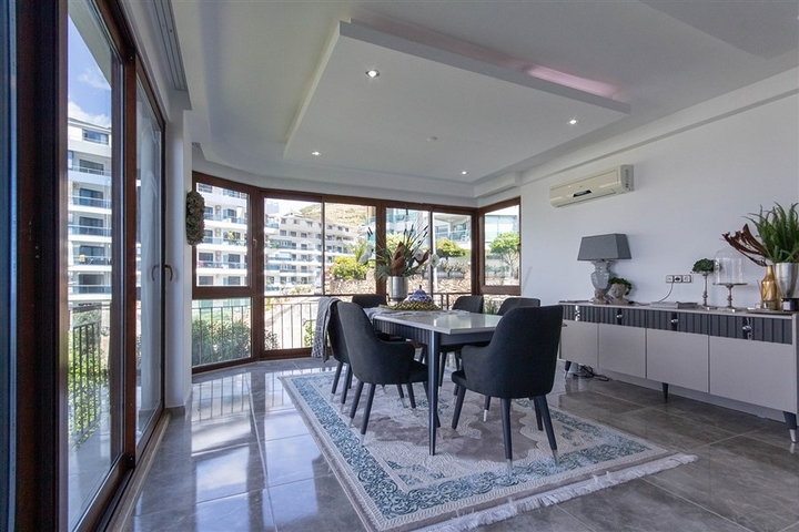 Садовый дуплекс 3+1 с видом на море в районе Каргыджак