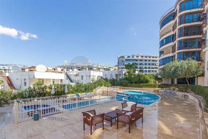 Садовый дуплекс 3+1 с видом на море в районе Каргыджак