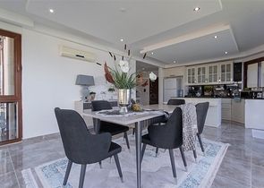 Садовый дуплекс 3+1 с видом на море в районе Каргыджак